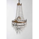 An early 20th century three tier cascading drop ceiling chandelier