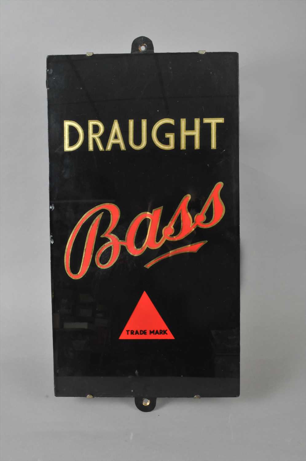 An original slate-backed pub sign advertising Draught Bass