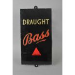 An original slate-backed pub sign advertising Draught Bass