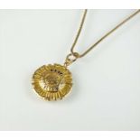 A 15ct gold medallion pendant