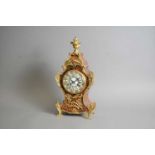 A French Louis XV style simulated boulle marquetry mantel clock, marked Mappin & Webb Ltd