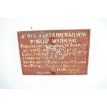 A large original North Eastern Railway cast iron warning sign