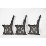 A trio of GWR (Great Western Railway) cast iron bench ends