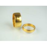 Two 22ct gold wedding bands