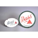 A small original circular enamel " Bass" in bottle advertising sign and a Bass mirror