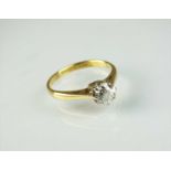 An 18ct gold single stone diamond ring