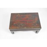A 19th century Chinese Chinoiserie lacquered low hardwood table