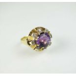 An amethyst and diamond dress ring