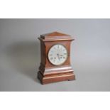 A 19th century mahogany cased mantle clock, W. Mahr, 90 Bolsover St, London, lenzkirch