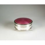 A silver and enamel trinket box