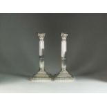 A pair of Victorian silver candlesticks