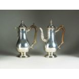 A George III style silver coffee pot and hot water jug