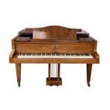A late 19th century Bluthner iron framed walnut cased boudoir grand piano