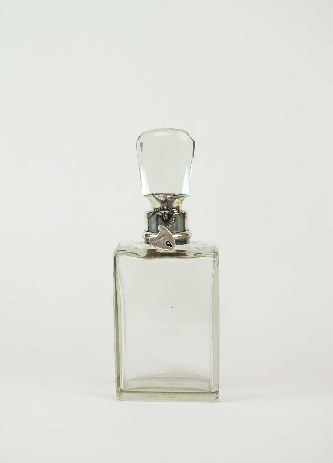 A silver mounted lockable decanter