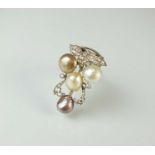 A diamond and pearl clip brooch