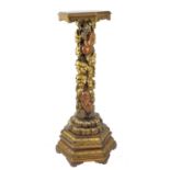 A 20th century Japanese carved torchere, in the form of two monkeys climbing a tree, chasing a frog,