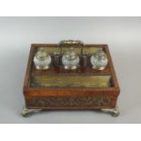 A Regency mahogany and brass inlaid desk stand,
