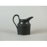 A rare Caughley black basalt cream jug