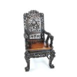 A large late 19th / early 20th century Chinese carved hardwood armchair