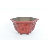A late 18th century / early 19th century Chinese cinnabar lacquer hexagonal bowl, decorated in