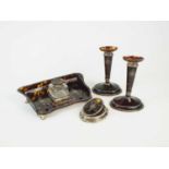 An Edwardian William Comyns & Sons silver and tortoiseshell desk set