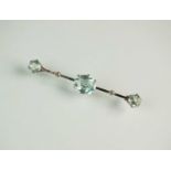 An aquamarine and diamond bar brooch