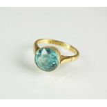 A single stone blue zircon ring