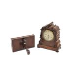 A Victorian mahogany bracket timepiece, the foliate scroll carved, shaped case, with a plinth on