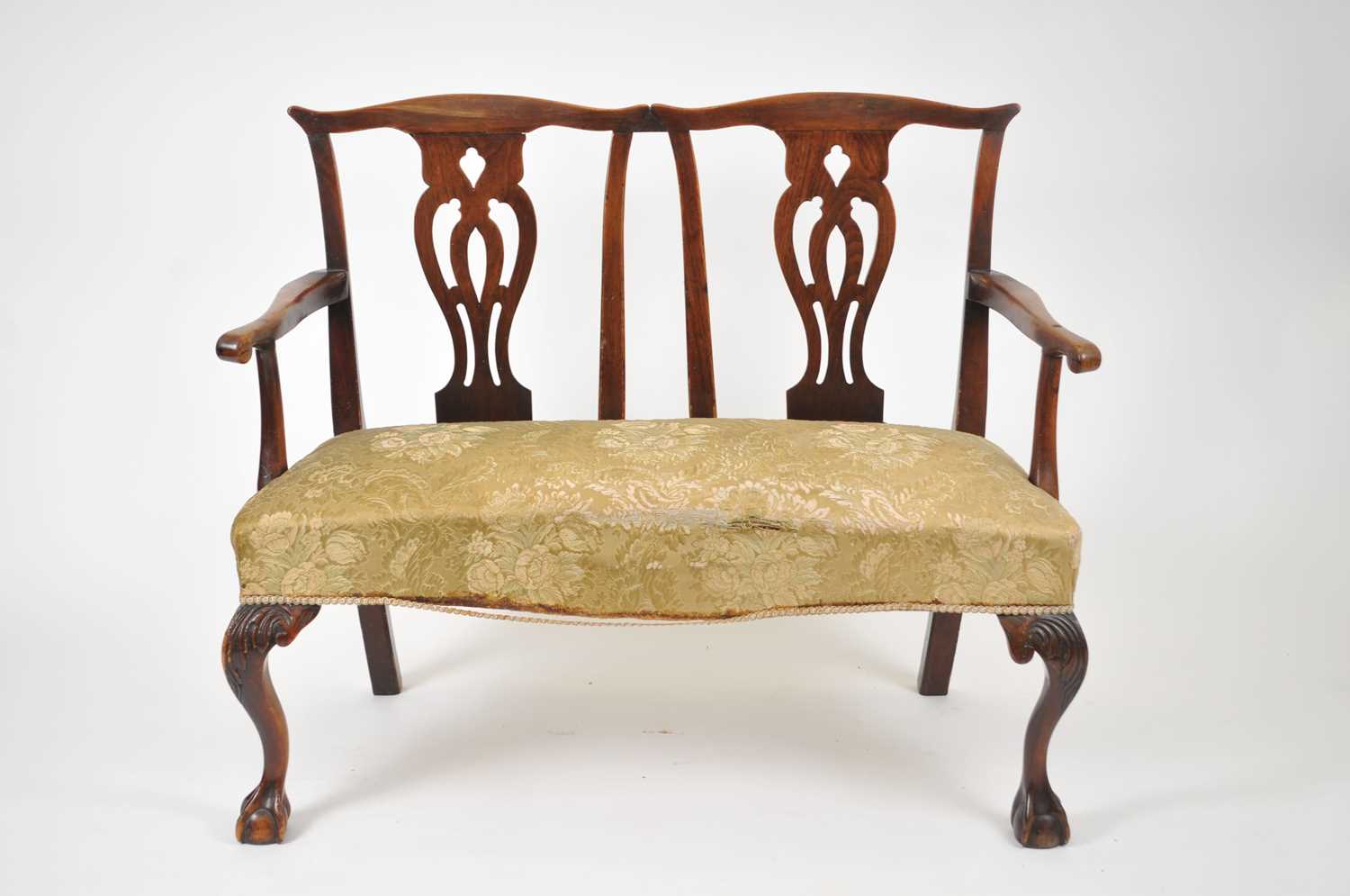 A 19th century, George II style, mahogany two-seater settee, in the style of Chippendale, with