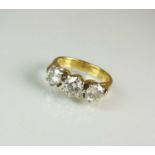 A three stone diamond ring