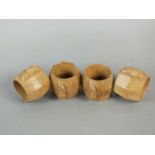 Workshop of Robert Mouseman Thompson (Kilburn) a set of four oak napkin rings