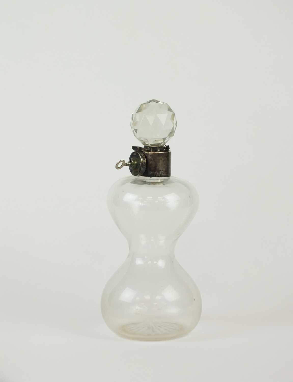 A silver mounted lockable decanter