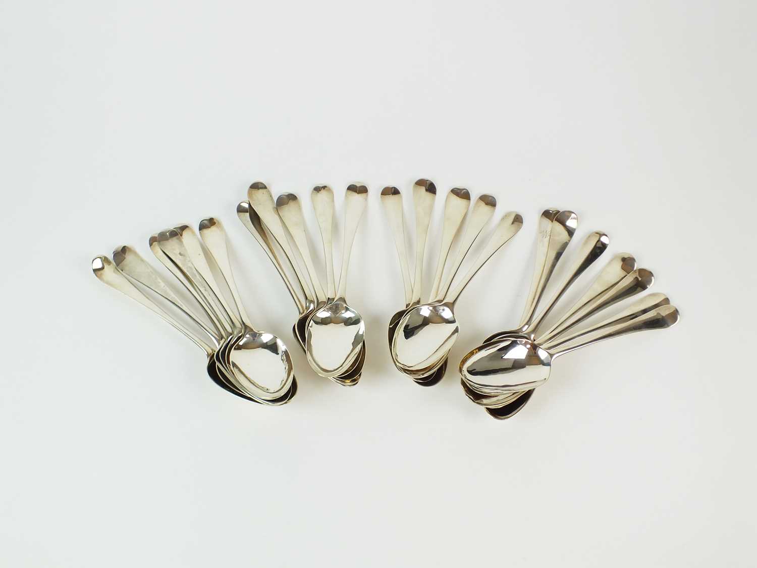 A collection of mid-18th century Hanoverian pattern silver tablespoons