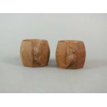 Workshop of Robert Mouseman Thompson (Kilburn) a pair of carved oak napkin rings