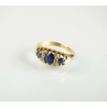 An 18ct gold sapphire and diamond ring