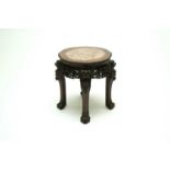 A Chinese carved rosewood and marble vase stand, 19th century