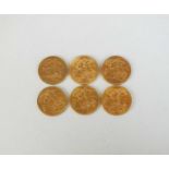 A collection of six half sovereigns