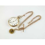 A 9ct gold open face pocket watch and Albert