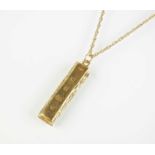 A 9ct gold ingot pendant