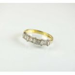 An 18ct gold diamond half hoop eternity ring