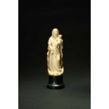 A French carved ivory figure of the Madonna and child, 19th century