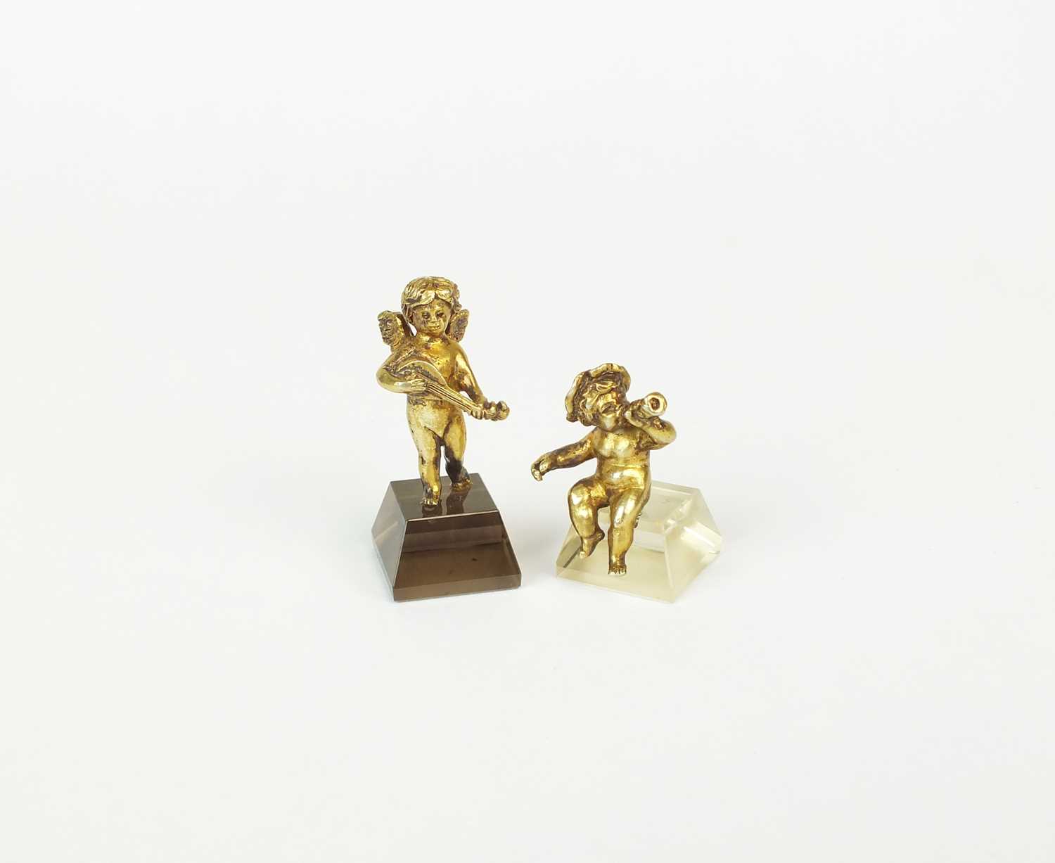 Two miniature models of putto