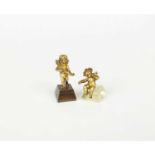Two miniature models of putto