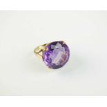 A single stone amethyst dress ring