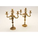 A pair of 19th century Rococo style, gilt bronze five branch candelabrum, pierced and moulded