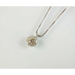 A diamond cluster pendant