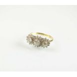 An 18ct gold diamond cluster ring