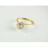 An 18ct gold single stone diamond ring