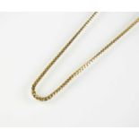 A yellow metal box curb link necklace