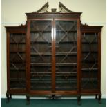 A George III style mahogany break-front glazed display cabinet